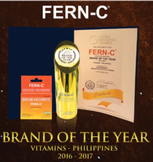 fern-c next to the gold brand of the year award