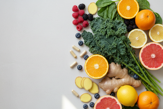 Citrus, berries, greens, ginger, and supplement capsules for an immune support guide.
